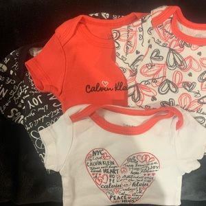 Set of 4 Calvin Klein onesies 3-6M